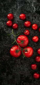 Fresh red tomatoes on a dark rustic backdrop, perfect for mobile wallpaper.