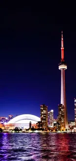 Vibrant Toronto skyline featuring CN Tower at night with city lights.