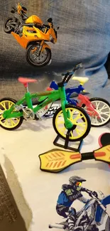 Vivid toy bikes and motorcycle on a gray background.