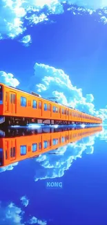 Train mirrored against vivid blue sky and clouds.