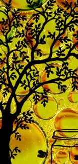 Silhouette of a tree on vibrant yellow abstract background with bubbles.