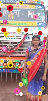 Colorful Indian truck with women in traditional attire.