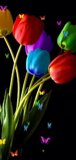 Vibrant tulips on a striking black background make this wallpaper eye-catching.