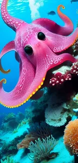 Pink octopus exploring a colorful coral reef underwater.