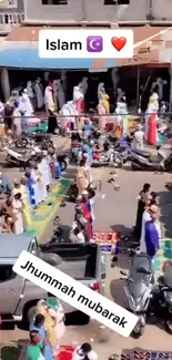 Aerial view of a vibrant community gathering outside a mosque on a busy street.