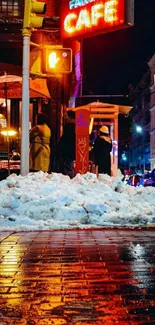 Vibrant city street with neon cafe sign at night.