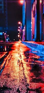 Vibrant city street nightscape with neon reflections on wet pavement.