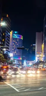 Vibrant city nightscape with colorful lights and busy street.