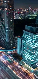 Vibrant city nightscape with illuminated skyscrapers and bustling streets.