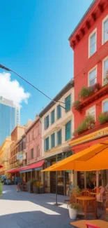 Colorful urban street with cafes and blue sky