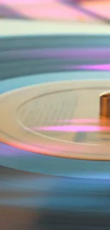 Vibrant vinyl record with purple and orange hues spinning smoothly.