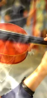 Vibrant orange violin with artistic touches.