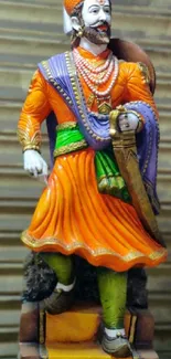 Colorful warrior statue in traditional attire for mobile wallpaper.