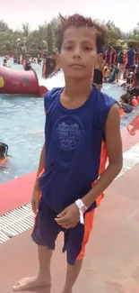 Child enjoying at water park in vibrant summer setting.