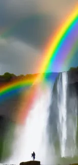 Dynamic waterfall with a vibrant rainbow arching over lush greenery on a phone wallpaper.