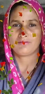 Portrait of a woman in vibrant traditional attire with colorful confetti accents.