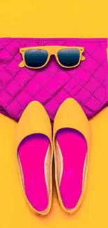 Yellow shoes and pink purse with sunglasses on vibrant background.