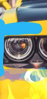 Close-up of a vibrant yellow car with a modern headlight design.