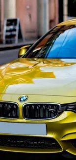 Vibrant yellow car parked on a street with reflections.