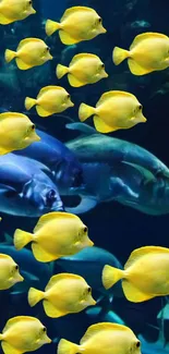 Yellow fish swimming in deep blue ocean.