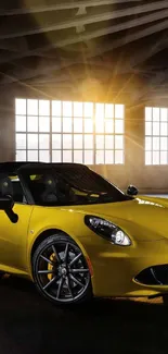 Vibrant yellow sports car in a sunlit industrial setting.