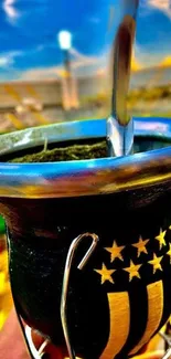 Yerba mate cup with stadium background, vibrant colors.