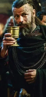 Viking warrior with a goblet and chain.