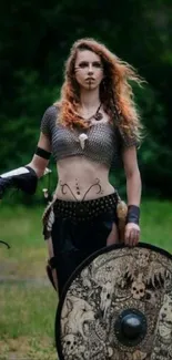 Fierce female Viking warrior with shield in forest.