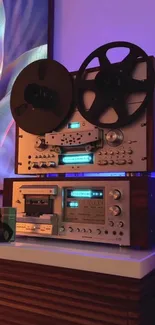 Vintage reel-to-reel audio equipment with moody lighting.