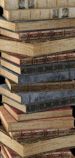 Tall stack of vintage books on a black background, classic aesthetic.