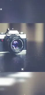 Vintage camera with dark blue background and soft focus effect.