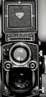 Black and white Rolleiflex vintage camera close-up wallpaper.