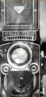 Black and white vintage Rolleiflex camera wallpaper.