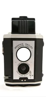 Vintage Kodak Brownie camera with a black and white design, perfect for retro enthusiasts.