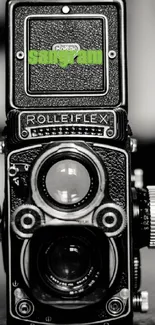 Black vintage Rolleiflex camera wallpaper.