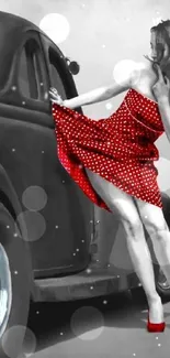 Elegant lady in red polka dot dress with vintage car in background.