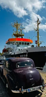 Vintage car by ship in sunny harbor scene.