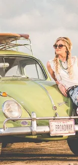 Vintage green car with woman by beach, retro vibes.