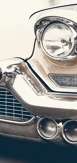 Mobile wallpaper with vintage car and chrome features.