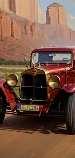 Vintage red car driving through desert landscape by canyons.