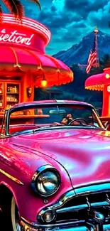 Vintage car parked at a neon-lit diner with mountain backdrop.