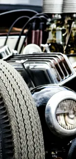 Close-up of vintage car engine and headlight.