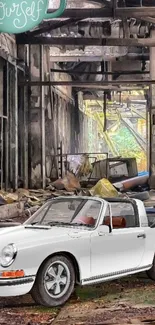 Vintage car in abandoned factory with a motivational message on a mobile wallpaper.