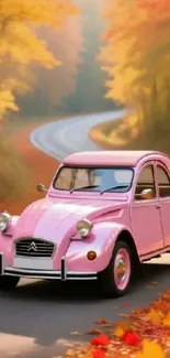 Vintage pink car on an autumn road with vibrant fall foliage.