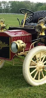 Vintage car with brass and leather in countryside landscape.