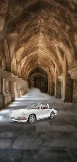 Vintage convertible in a gothic stone corridor with arches.