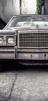 Vintage car parked in a narrow alley with gritty gray textures.