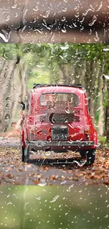 Vintage car drives on a rainy, leafy road with raindrops on camera lens.