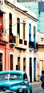 Vintage car in colorful street with historic buildings.