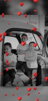 Vintage car with kids and red hearts wallpaper.